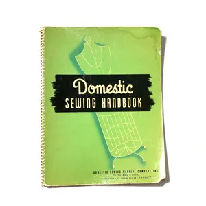 Book: Domestic Sewing Handbook Green with Black and Cream Spiral binding