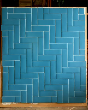 Extra Large Indigo Blue Subway Tile in a Chevron Patter. Surface. Tiled Surface. Table Top Photography