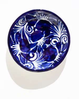 Mexican Clay Ceramic Plate with a Traditional Blue and White Painted Flower Pattern
