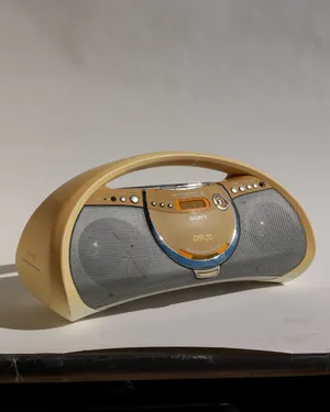 1990s Sony Boombox. CD Player, Transportable Stereo, Yellow From Age, Unique Arched Design