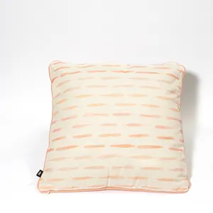 Cream colored throw pillow with Pink, peach and pail pink modern drip design - 16
