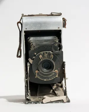 Antique Kodak Camera, Foldable, Silver Metal with Black Bellows, Vintage Technology 1920