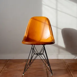 Vintage Pumpkin Orange Leather Original Earmes Chair