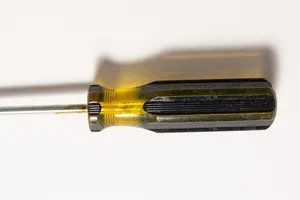 Vintage Tool Stanley Screwdriver with clear Yellow Handle and Black Stripes