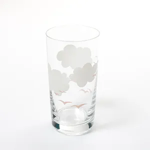 Clear Water juice glass with fluffy white clouds and pink flying birds on the outside - 5.25