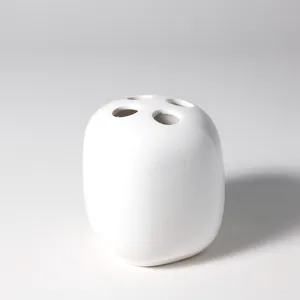 White Ceramic Toothbrush Holder