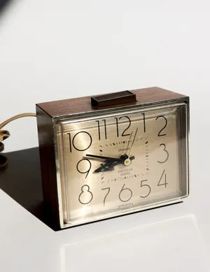 Vintage 1960s Alarm Clock Wood Grain Housing and Light Gold Face