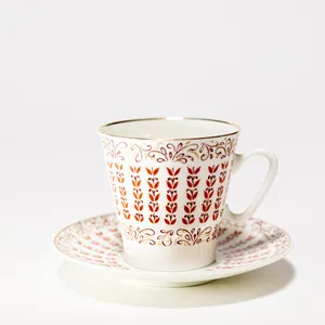 VINTAGE RUSSIAN USSR DEMITASSE CUP SAUCER SET Red and Gold Flower repeating pattern LOMONOSOV PORCELAIN GOLD RIM