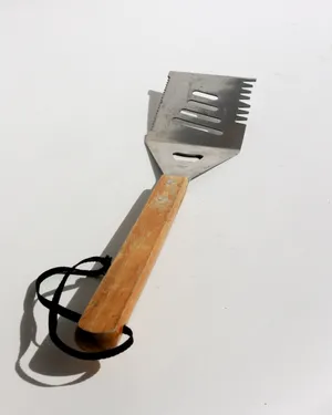 Silver BBQ Spatula with a Long Wooden Handle