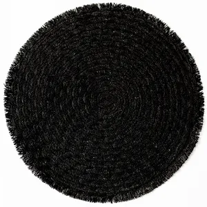 round black wicker woven  placemat with rough unfinished edge. 3