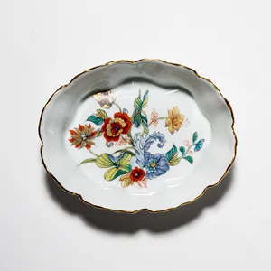 PORCELAIN CATHAY Oval FOOTED DISH White with Flowers on the bottom and gold trim