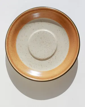 Vintage Stoneware Saucer Cream with Brown Speckles Orange Outer Rim and Bridge Edging Saucer