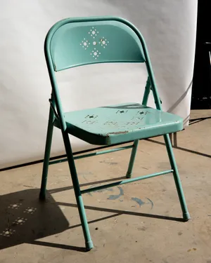 Turquoise, Vintage Metal Folding Chair with decorative cutouts. Used, Patina