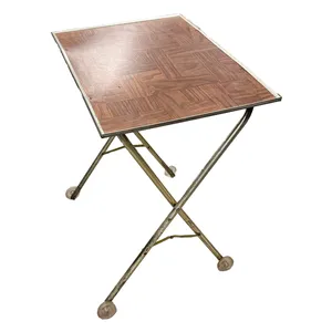 1970 rolling folding tv tray, faux parquet wood laminate on top