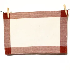 Kitchen Soft Goods: Off White Cotton Rectangle Placemat with Rust Brown Edging Overlapping at the Corners - 17.5