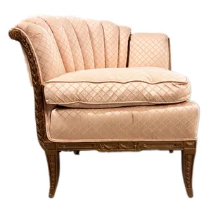 Fan Shaped Fluted Shell shaped Wingback chair Pale Pink Subtle Diamond Pattern with intricate carved wood legs and arm rests2
