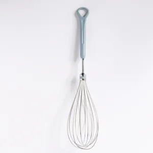 Vintage Blue plastic handled whisk - 13