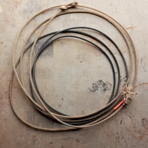 worn western lasso rope frayed tan black