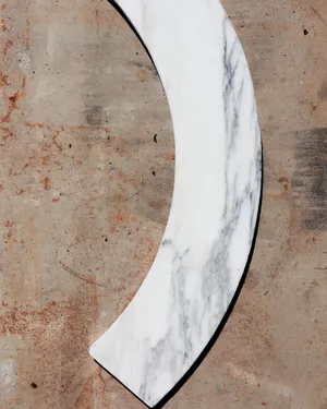 Crescent Shaped Cut White Granite with Gray Marbling