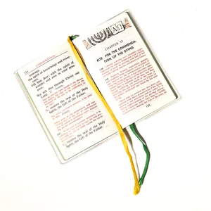 Book: Rite of Anointing and Pastoral Care of the Sick, Small PLastic covered book with a biird in flight and a gren and yellow ribbon place holders