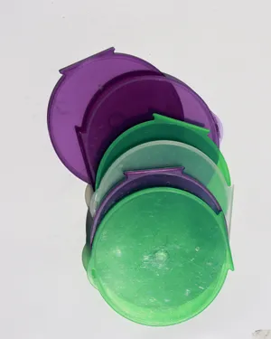 Assorted Colors Round Plastic CD or DVD Protective Case. Vintage Technology