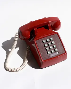 Vintage 1970s Ruby Red Push Button Phone with White Coil Cord