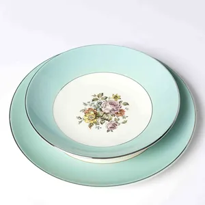 Fine China: Soup Bowl - Sketched Pink, Yellow and Green Flower Pattern in the middle on off White with a wide Tiffany Blue Robins Eggs Blue Band around the outside - 5.25