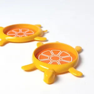 Vintage Orange and Yellow Plastic Turtle Drink Coaster 
