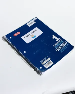 Used Navy Blue Spiral Notebook