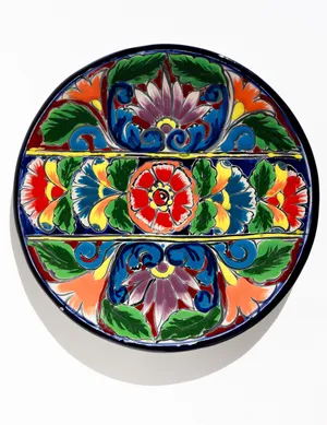 hand-painted Mexican Talavera pottery Dinner plate featuring vibrant floral designs
