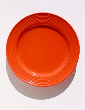 Hazard Santa Fe Orange Dinner Plate with wide raised striped rim