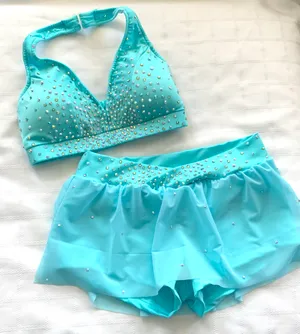 Max Bling aquamarine skirt set Small (markdown due to spray tan marks on straps)