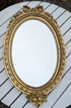 M4 oval gold bow mirror 21x12