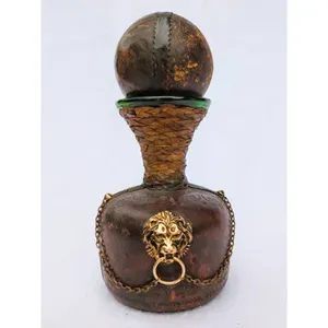 BC12 brass & leather lion bottle