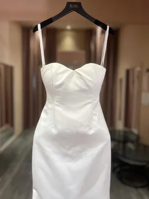1764 - A sleek, minimalist white dress