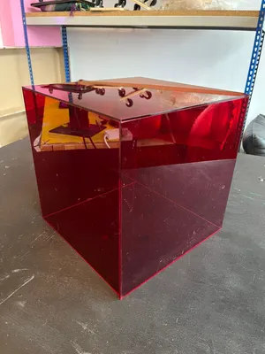 Red Perspex plinth
