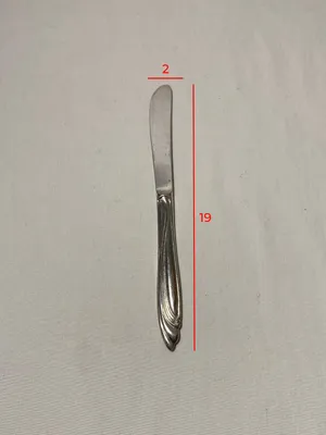 Coltello manico alato