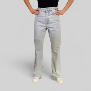 Světlé džíny COS 