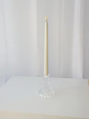 Glass crystal candlestick with candle