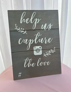 'capture the love' sign