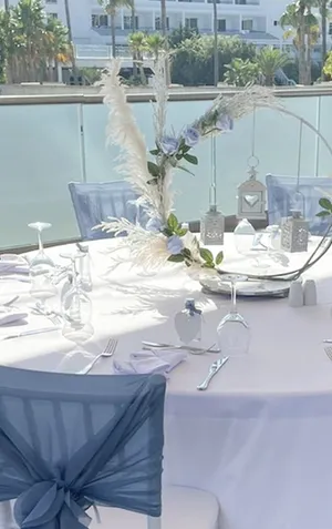 Halo arrangement with tealight lanterns and foliage base TP2033A 
