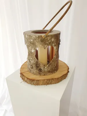 Rustic lantern with pillar candle on bark slice TP2002A