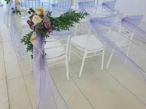 Corner chair arrangement with foliage and flowers CST2023