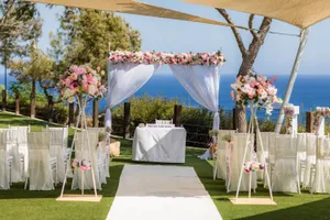 Tall modern stand with arrangement and hanging bird cage with floral base CEREMONY ONLY AS2022A 