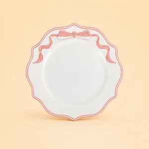 Scalloped Blush Bow Charger 