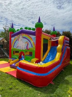 Large castle with slide & foam pit