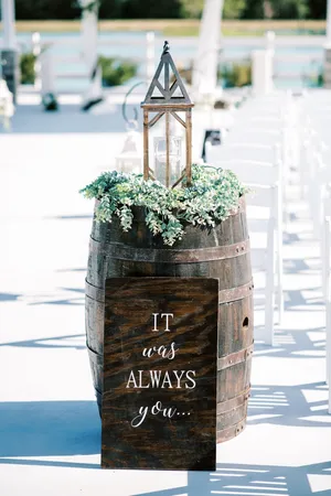 Whiskey Barrels Full Size..rent two and add on the top to make a table or add on Whiskey Barrel Arrangements!