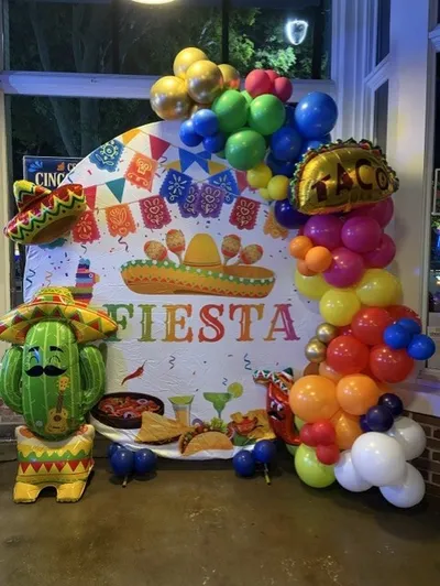 Cinco de Mayo balloon decor and fiesta backdrop for El Plato Mexican Restaurant in Lee's Summit MO