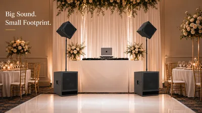 BASSBOSS BB15 subwoofers with DiaMon speakers arranged beside a wedding DJ booth