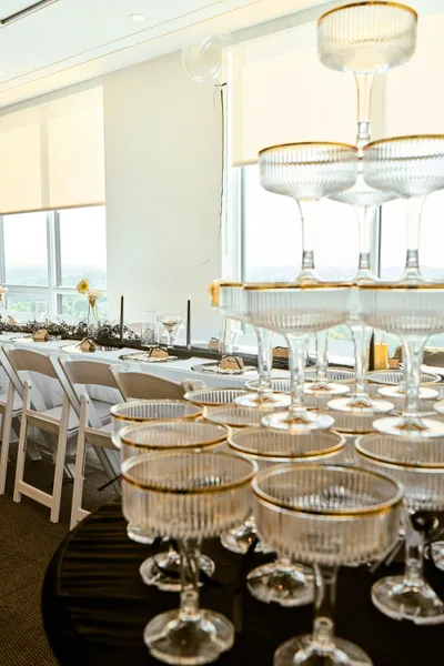 Elegant wedding setup with upgraded event rentals including tables, chairs, and décor